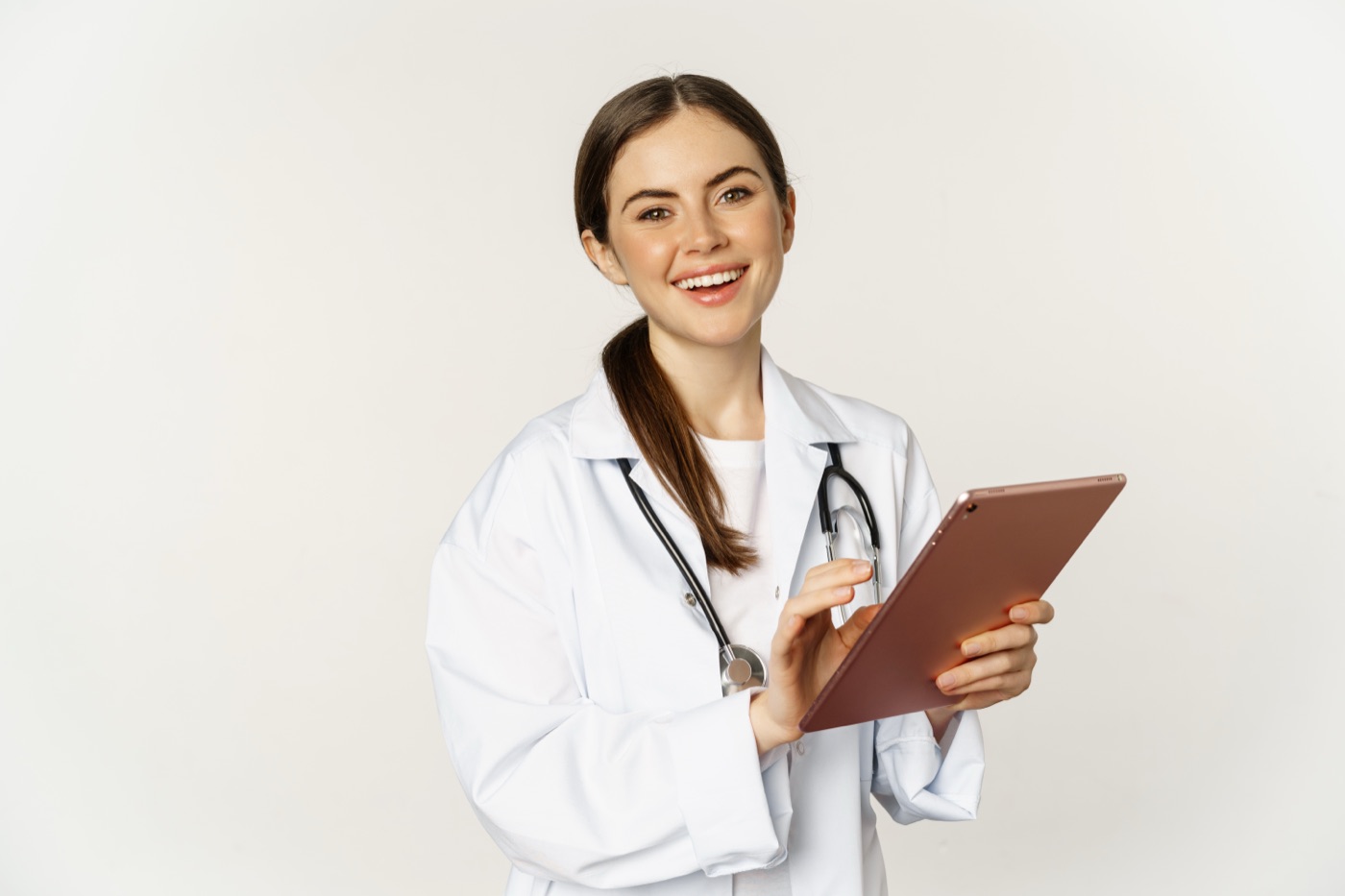 Doctor reviewing patient records on a tablet